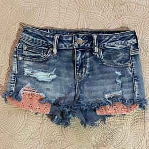 AEO Super Stretch Shortie Distressed Denim Shorts
